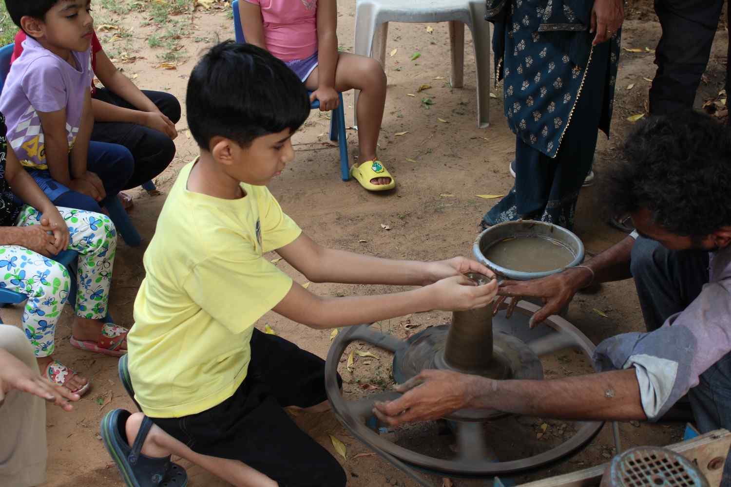 Child doing pottery