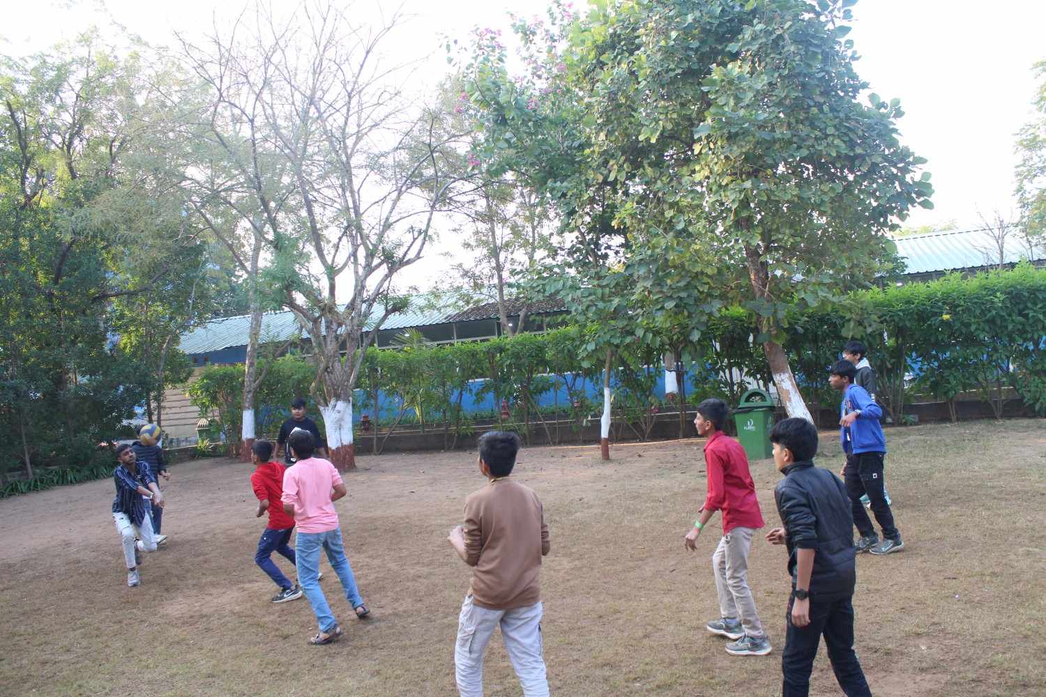 Boys playing volleyball