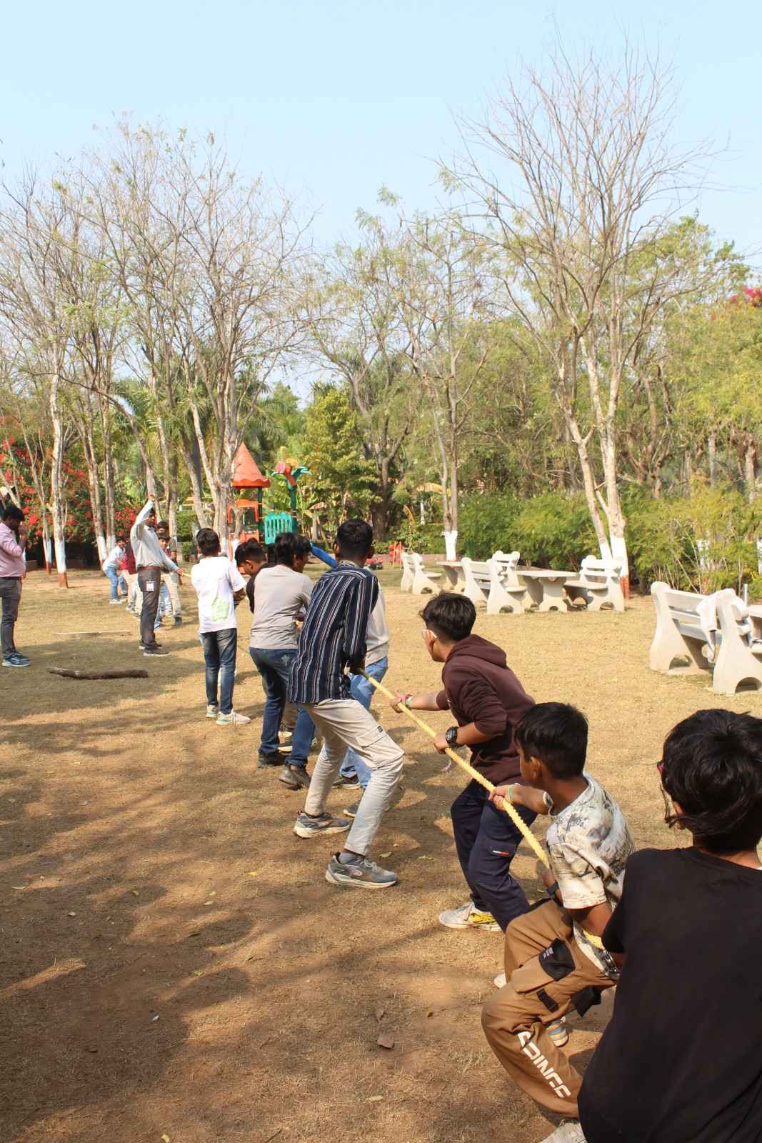 Boys competing in tug of war