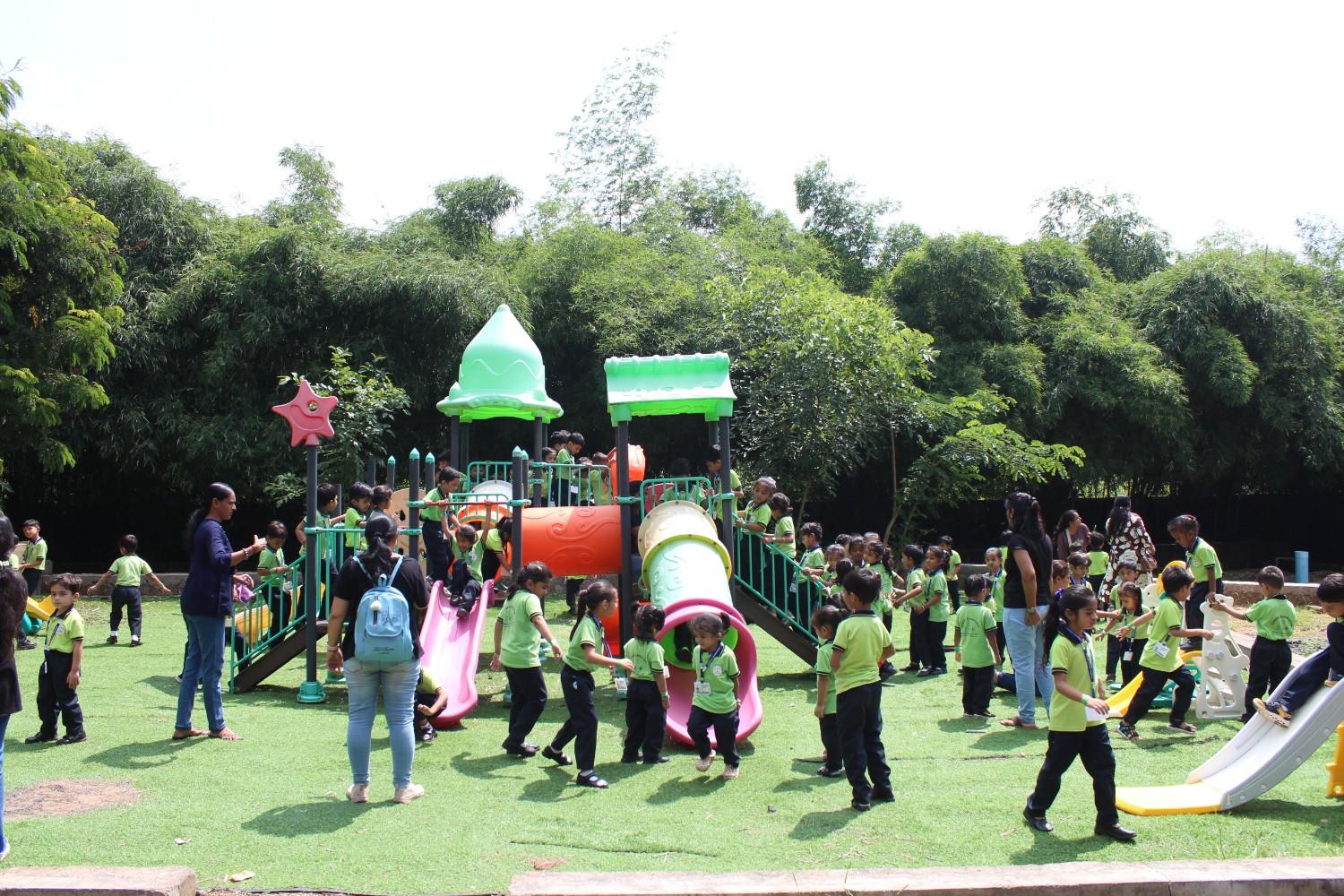 Children playing on slides at resort playground