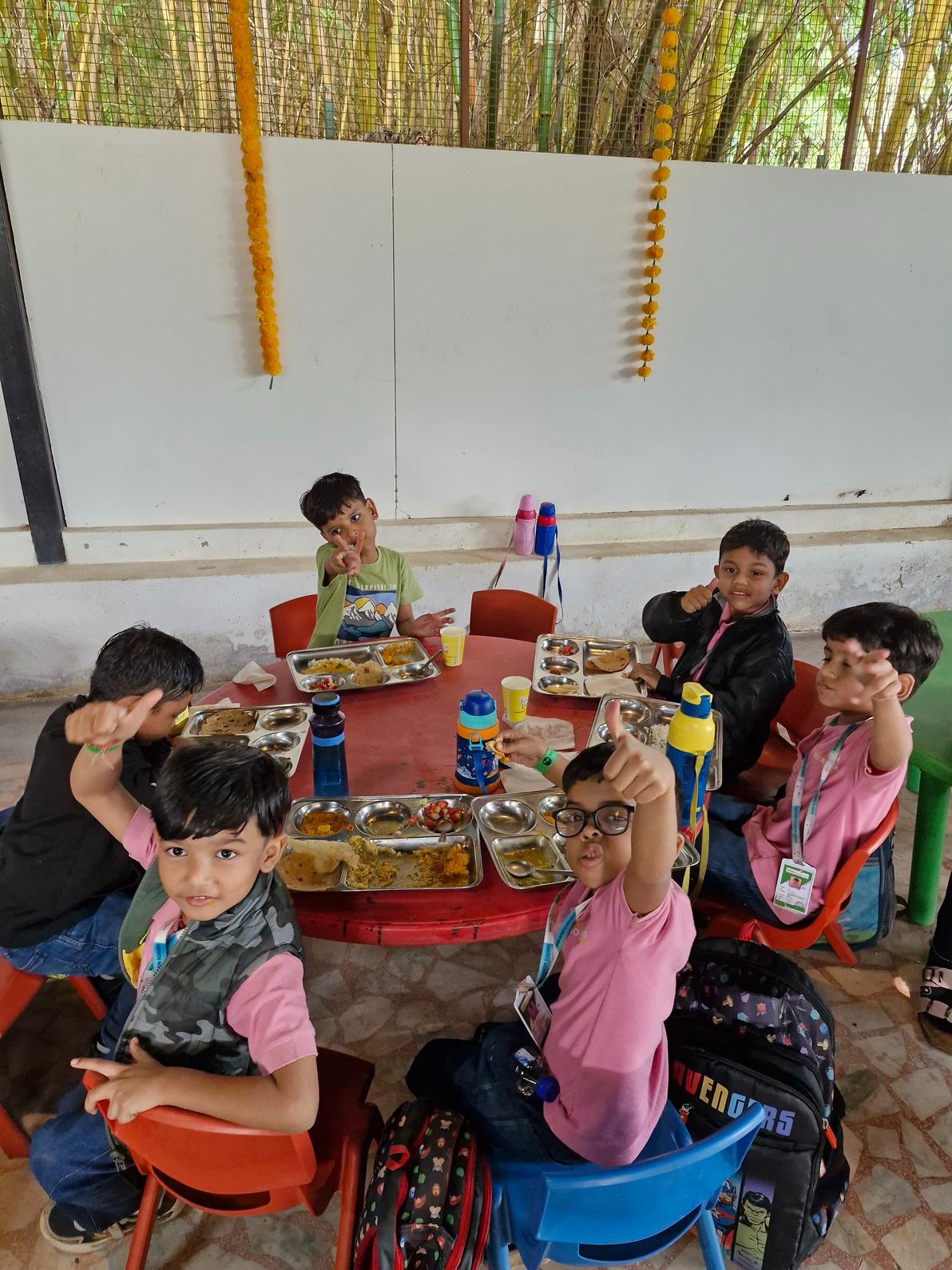 Students enjoying healthy lunch at resort