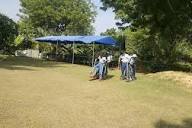 Scenic view of the campsite lawn and tents