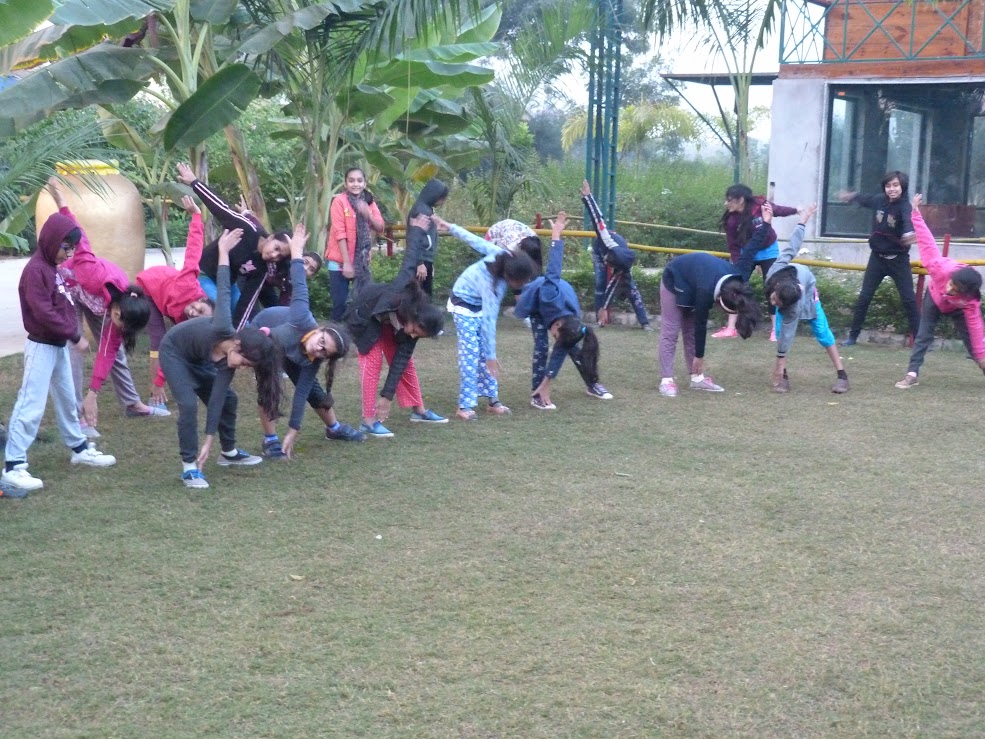 Morning yoga and stretching exercises outdoors