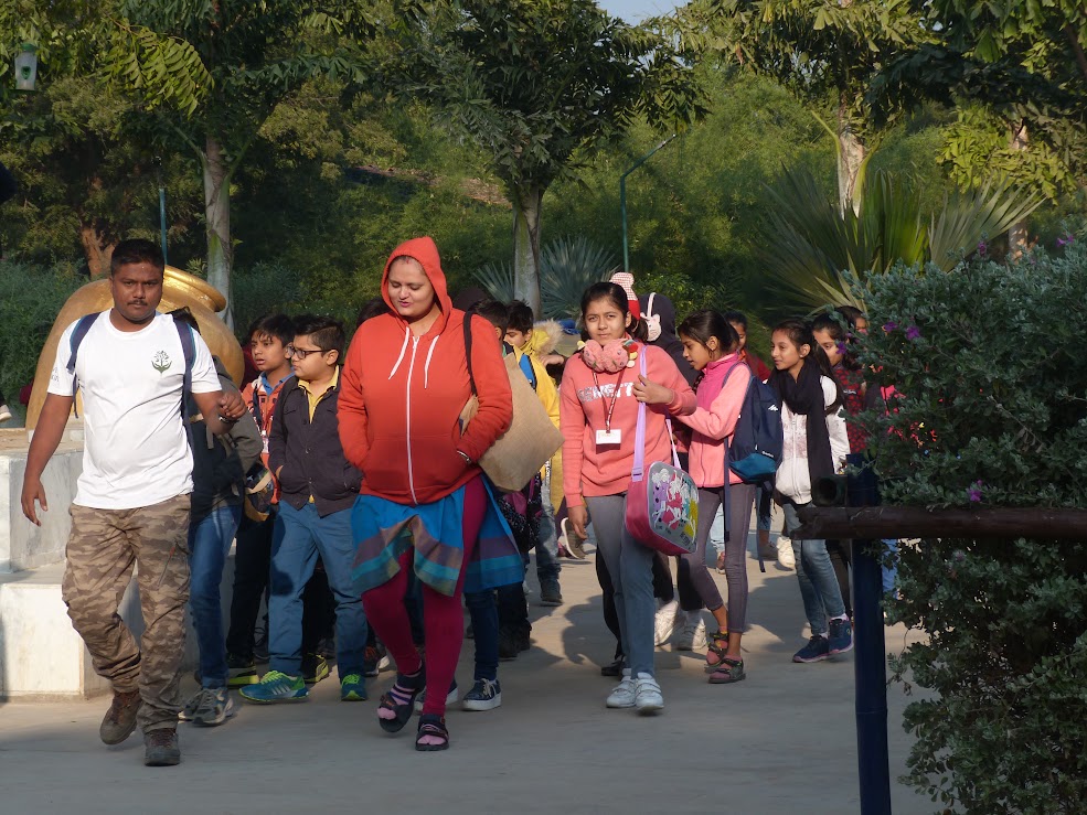 Students walking through the resort grounds during excursion