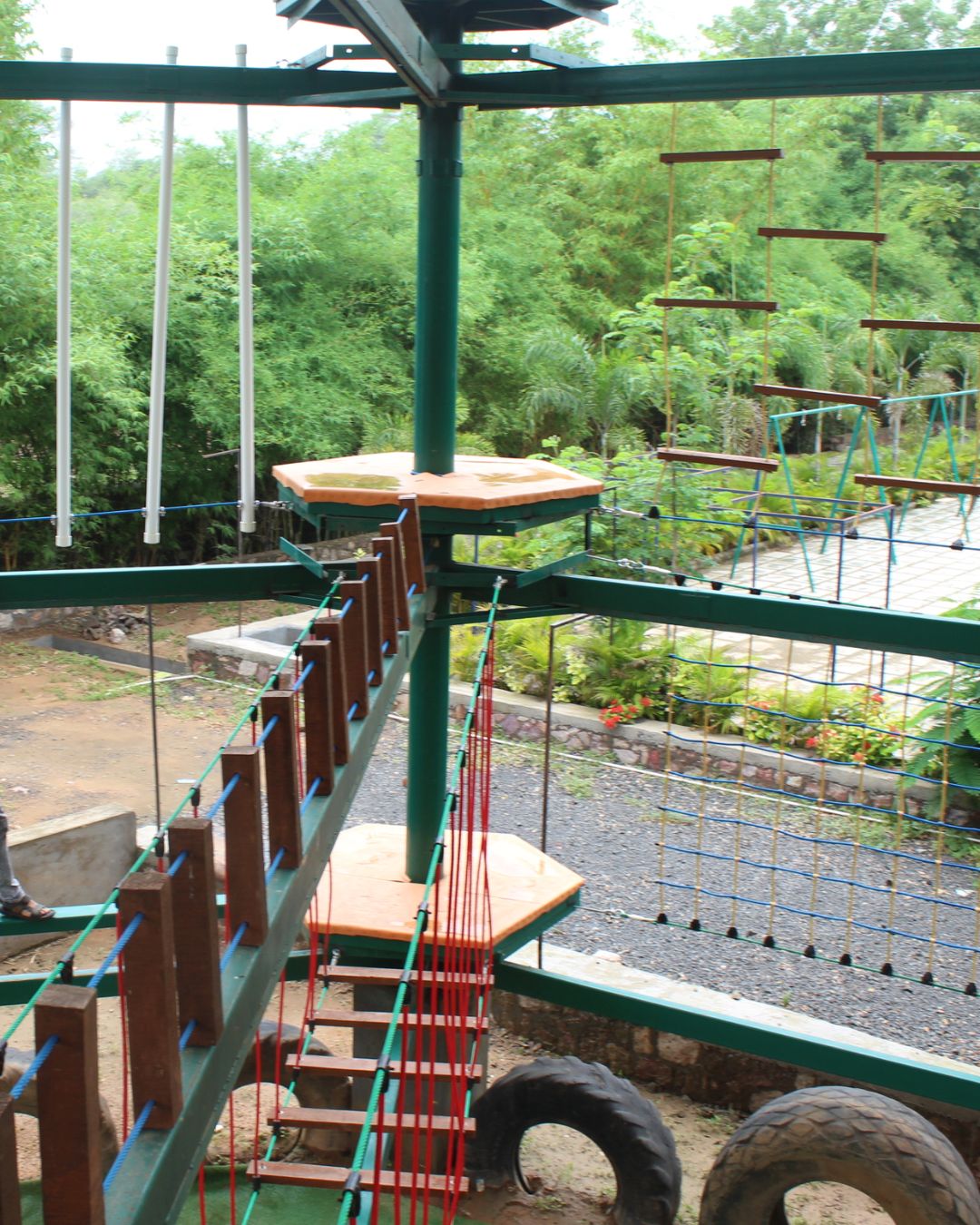 Multi-level high rope adventure course tower